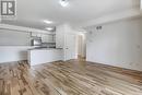 101 - 128 Barrie Street, Bradford West Gwillimbury, ON  - Indoor Photo Showing Kitchen 