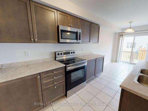 14 Longboat Run  W, Brantford, ON - Indoor Photo Showing Kitchen With Double Sink