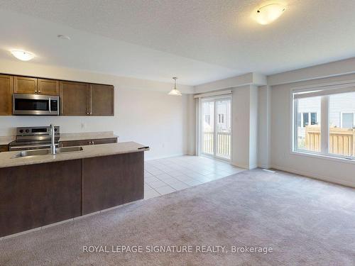 14 Longboat Run  W, Brantford, ON - Indoor Photo Showing Kitchen With Double Sink