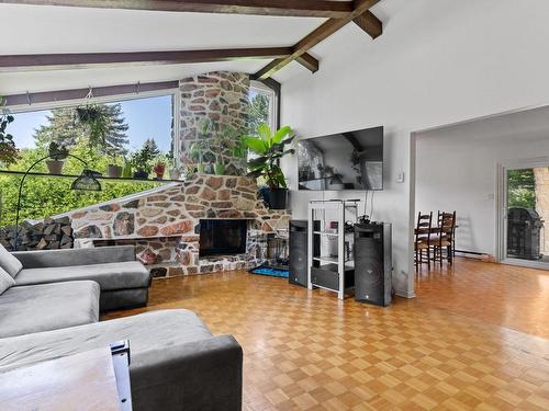 Salon - 709 Rue Claude, Saint-Jérôme, QC - Indoor Photo Showing Living Room With Fireplace