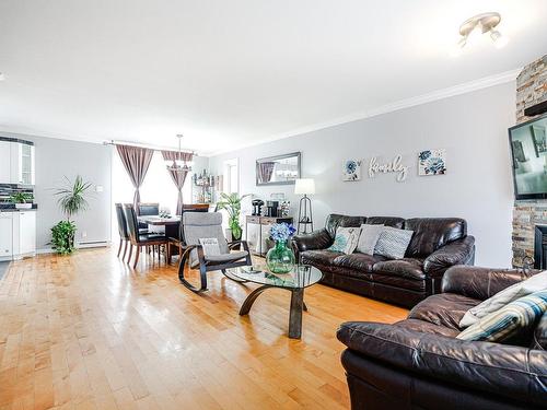 Salon - 14 Rue De L'Amandier, Saint-Constant, QC - Indoor Photo Showing Living Room With Fireplace