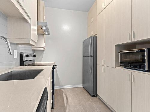 Kitchen - 712-9185 Rue Lennon, Brossard, QC - Indoor Photo Showing Kitchen