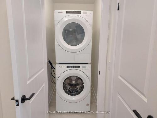 1306-3220 William Coltson Ave, Oakville, ON - Indoor Photo Showing Laundry Room