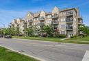 201-5705 Long Valley Rd, Mississauga, ON  - Outdoor With Balcony With Facade 