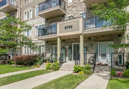 201-5705 Long Valley Rd, Mississauga, ON - Outdoor With Balcony With Facade