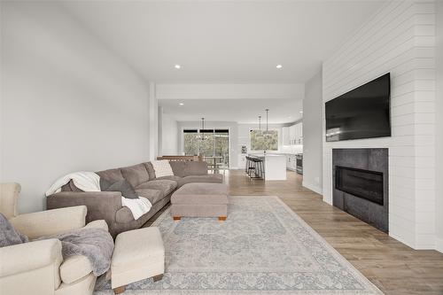 1901 Northern Flicker Court, Kelowna, BC - Indoor Photo Showing Living Room With Fireplace