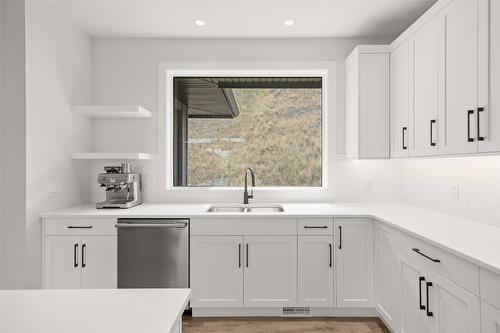 1901 Northern Flicker Court, Kelowna, BC - Indoor Photo Showing Kitchen With Double Sink