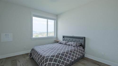 1110 Goldfinch Place, Kelowna, BC - Indoor Photo Showing Bedroom