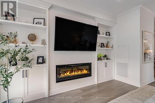 611 - 1880 Gordon Street, Guelph (Pine Ridge), ON - Indoor Photo Showing Living Room With Fireplace