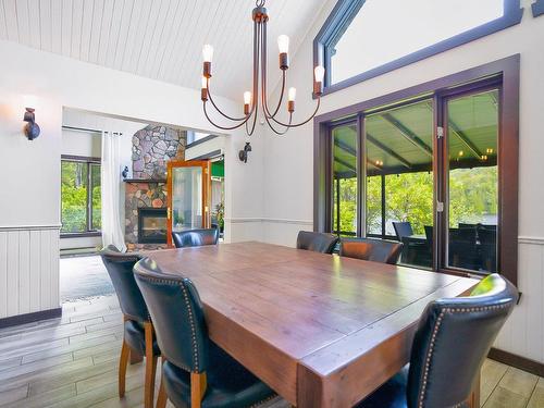 Dining room - 3431 Ch. Du Village, Saint-Adolphe-D'Howard, QC - Indoor Photo Showing Dining Room With Fireplace