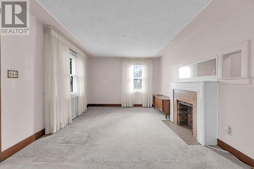 2371 Hamilton Road, London, ON - Indoor Photo Showing Other Room With Fireplace