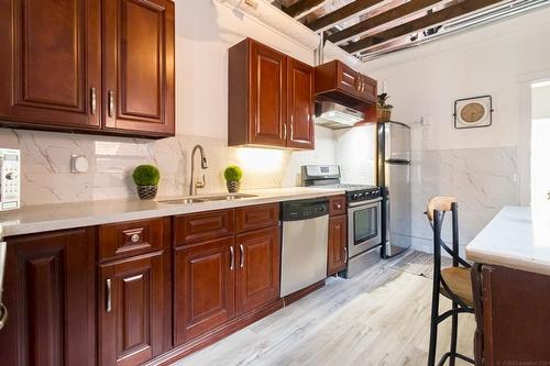 128 East Avenue N, Hamilton, ON - Indoor Photo Showing Kitchen With Double Sink