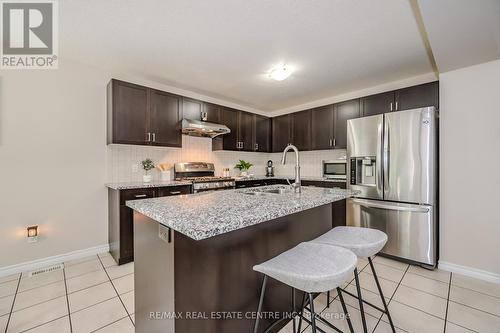 12 Summerfield Drive, Guelph (Pine Ridge), ON - Indoor Photo Showing Kitchen With Stainless Steel Kitchen With Upgraded Kitchen