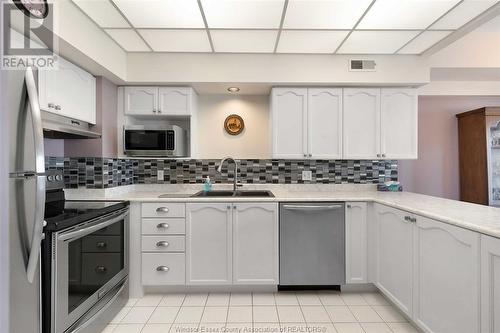 5064 Wyandotte Street East Unit# 606, Windsor, ON - Indoor Photo Showing Kitchen With Double Sink