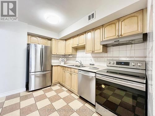 243 - 364 The East Mall, Toronto (Islington-City Centre West), ON - Indoor Photo Showing Kitchen With Double Sink