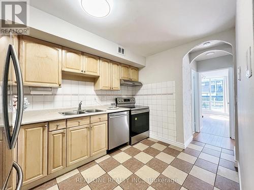 243 - 364 The East Mall, Toronto (Islington-City Centre West), ON - Indoor Photo Showing Kitchen With Double Sink