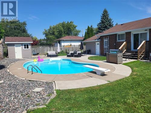 1765 Shawnee Road, Tecumseh, ON - Outdoor With In Ground Pool