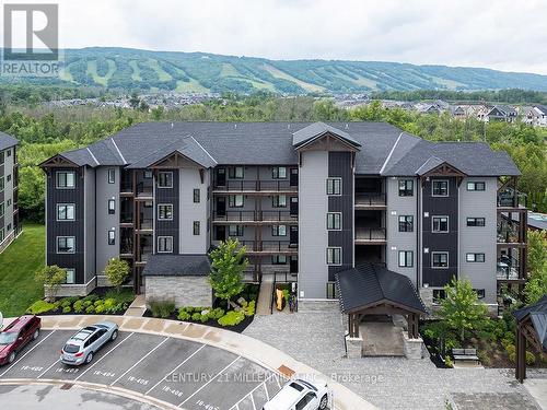 105 - 16 Beckwith Lane, Blue Mountains (Blue Mountain Resort Area), ON - Outdoor With Balcony With Facade