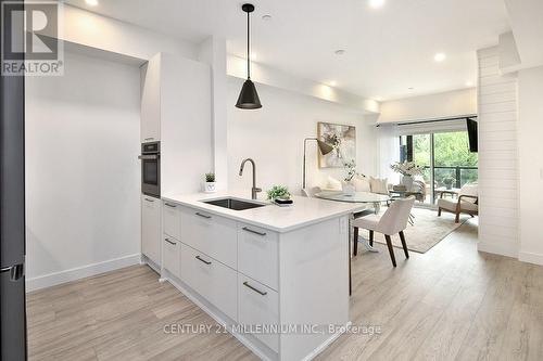 105 - 16 Beckwith Lane, Blue Mountains (Blue Mountain Resort Area), ON - Indoor Photo Showing Kitchen With Upgraded Kitchen