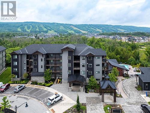 105 - 16 Beckwith Lane, Blue Mountains (Blue Mountain Resort Area), ON - Outdoor With Balcony With Facade