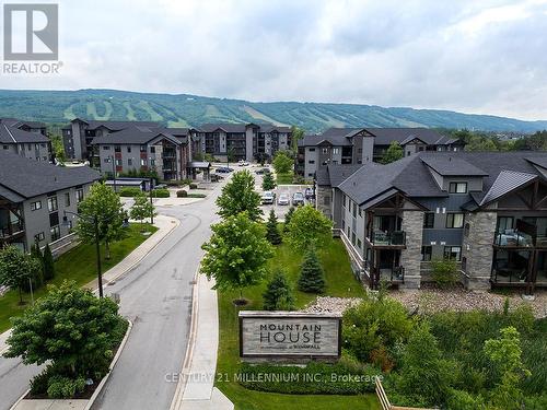 105 - 16 Beckwith Lane, Blue Mountains (Blue Mountain Resort Area), ON - Outdoor With Balcony With Facade