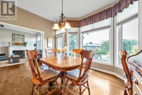 11 Cawkers Cove Road, Scugog (Port Perry), ON - Indoor Photo Showing Dining Room With Fireplace