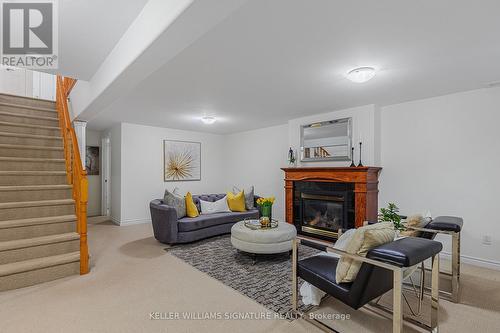 21 Logan Court, Barrie (Holly), ON - Indoor Photo Showing Living Room With Fireplace