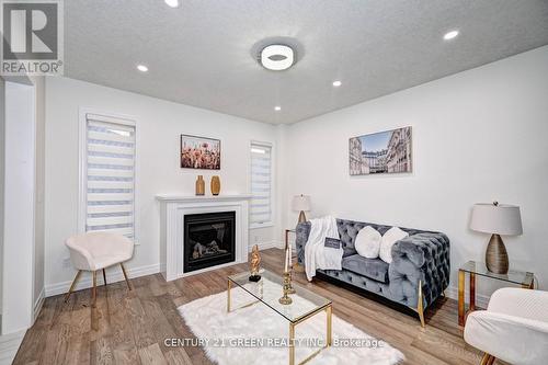 352 Chokecherry Crescent, Waterloo, ON - Indoor Photo Showing Living Room With Fireplace