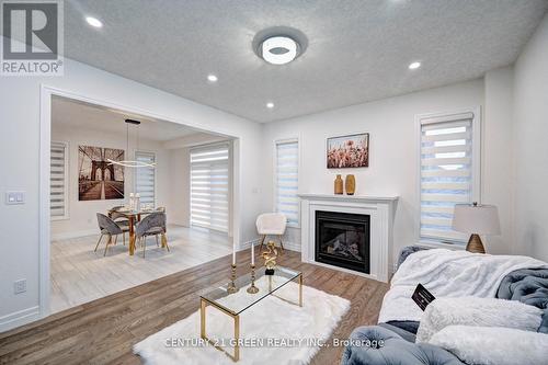 352 Chokecherry Crescent, Waterloo, ON - Indoor Photo Showing Living Room With Fireplace