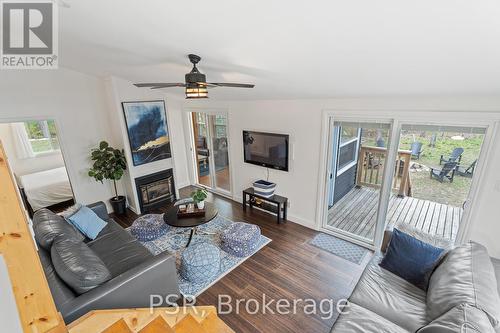 281 Stewart Lake Road, Georgian Bay, ON - Indoor Photo Showing Living Room With Fireplace