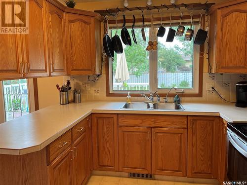 740 Rick Smith Crescent, Weyburn, SK - Indoor Photo Showing Kitchen With Double Sink