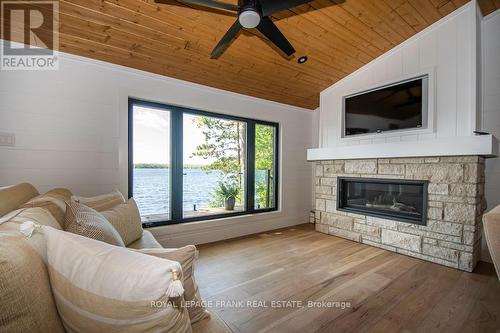 119 Fire Route 242, Galway-Cavendish And Harvey, ON - Indoor Photo Showing Living Room With Fireplace