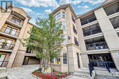 105 - 1487 Maple Avenue, Milton (Dempsey), ON - Outdoor With Facade