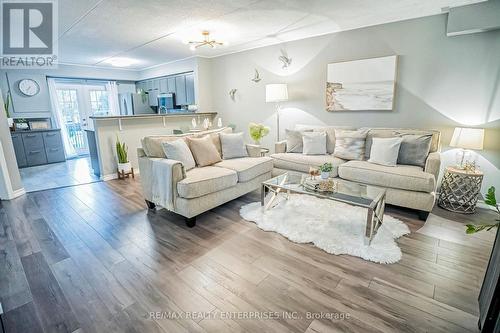 105 - 1487 Maple Avenue, Milton (Dempsey), ON - Indoor Photo Showing Living Room