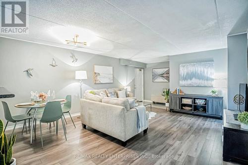 105 - 1487 Maple Avenue, Milton (Dempsey), ON - Indoor Photo Showing Living Room