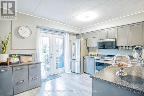 105 - 1487 Maple Avenue, Milton (Dempsey), ON - Indoor Photo Showing Kitchen