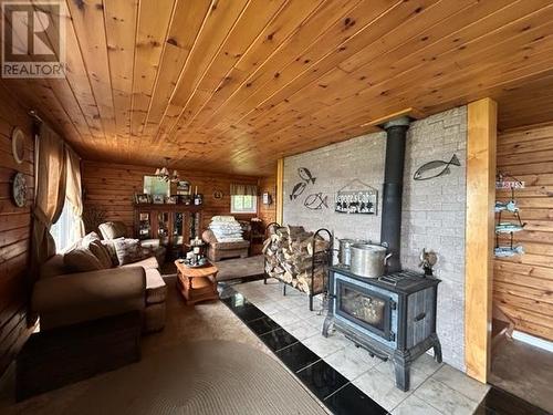 Ranger Lake, Searchmont, ON - Indoor Photo Showing Living Room With Fireplace