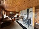 Ranger Lake, Searchmont, ON  - Indoor Photo Showing Living Room With Fireplace 