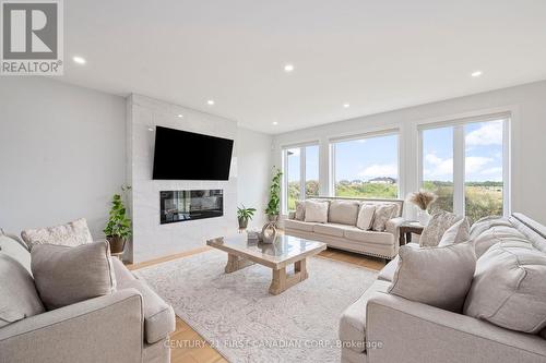 59 Wayside Lane, Southwold (Talbotville), ON - Indoor Photo Showing Living Room With Fireplace