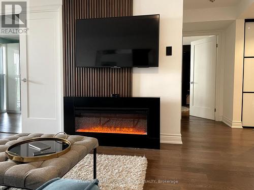 707 - 2091 Hurontario Street, Mississauga (Cooksville), ON - Indoor Photo Showing Living Room With Fireplace