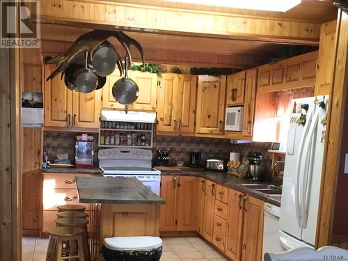 105 Federal St, Kirkland Lake, ON - Indoor Photo Showing Kitchen With Double Sink