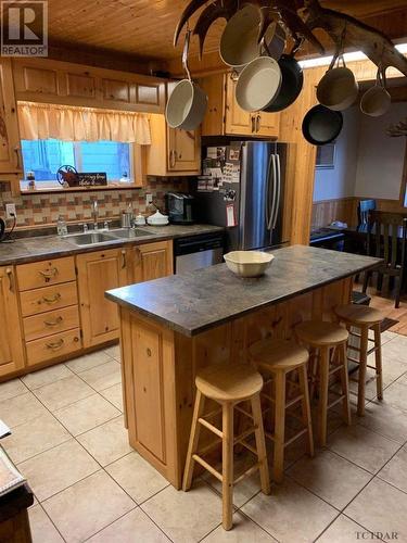 105 Federal St, Kirkland Lake, ON - Indoor Photo Showing Kitchen With Double Sink