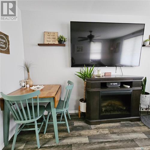 192 23Rd Street, Battleford, SK - Indoor Photo Showing Dining Room With Fireplace