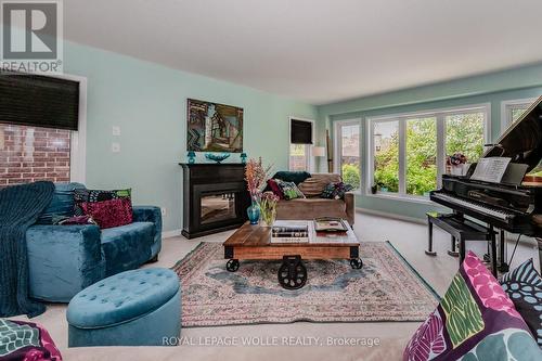 565 Sundew Drive, Waterloo, ON - Indoor Photo Showing Living Room With Fireplace