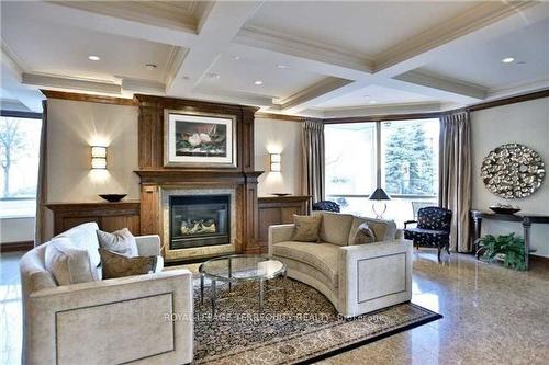 901-1900 The Collegeway, Mississauga, ON - Indoor Photo Showing Living Room With Fireplace