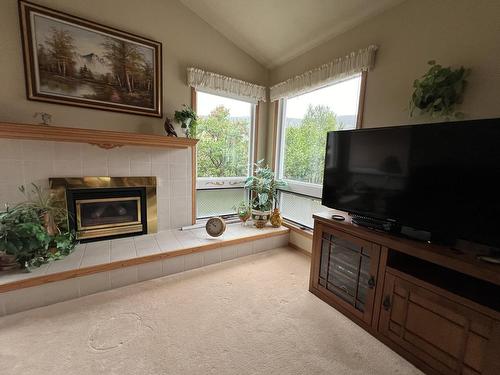 2265 Cleasby Street, Merritt, BC - Indoor Photo Showing Living Room With Fireplace