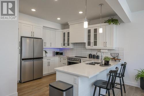 410 4274 22Nd Avenue, Prince George, BC - Indoor Photo Showing Kitchen With Stainless Steel Kitchen With Double Sink With Upgraded Kitchen