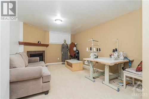 14 Croxley Way, Ottawa, ON - Indoor With Fireplace