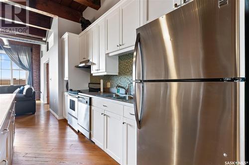 301 1205 Broad Street, Regina, SK - Indoor Photo Showing Kitchen With Double Sink