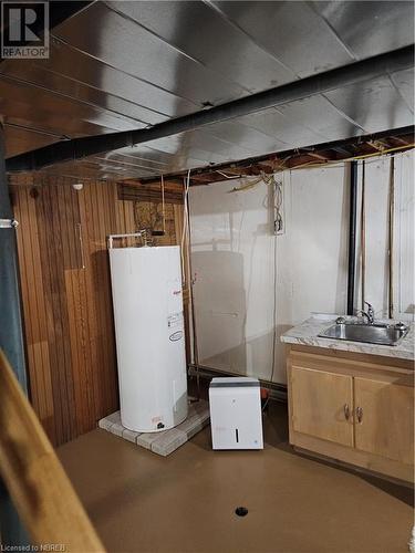 hot water tank rental, basement - 541 Brydges Street, Mattawa, ON - Indoor Photo Showing Basement